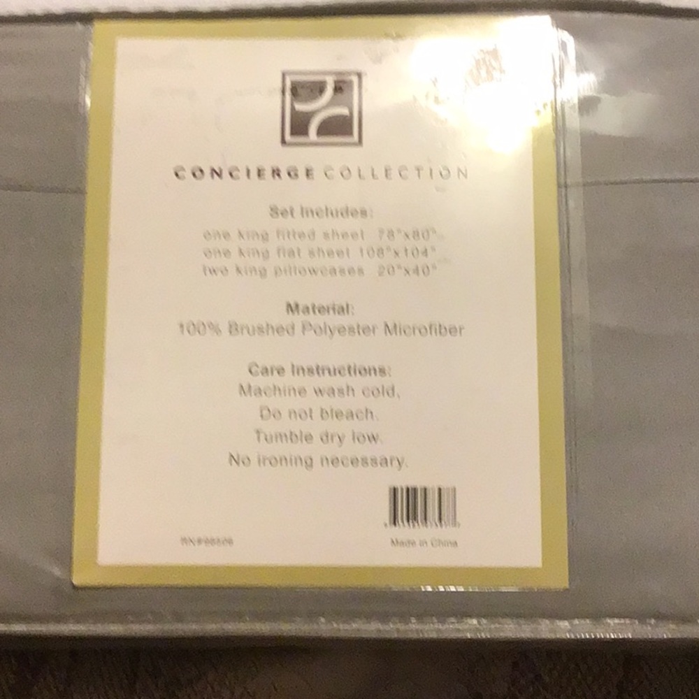 NWT KING SHEET SET CONCIERGE COLLECTION LIGHT GRAYSET. Still in zippered bag